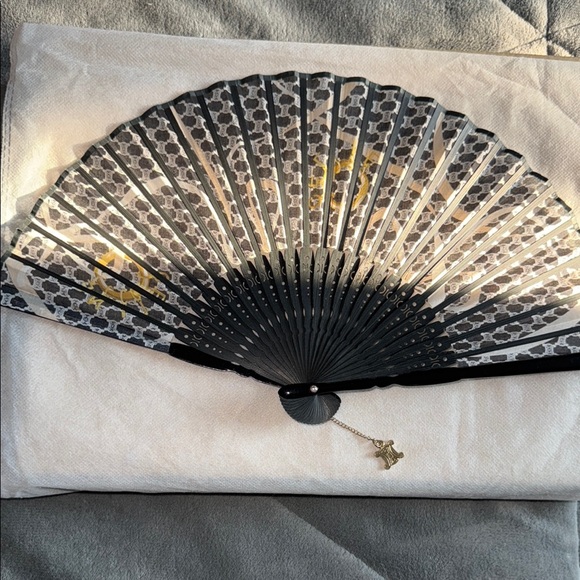 Celine Other - Preloved Celene fan Collection black excellent condition comes with pouch.